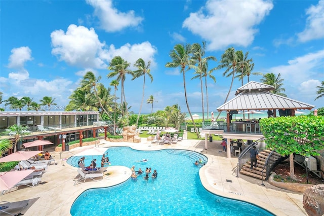 view of pool featuring a patio