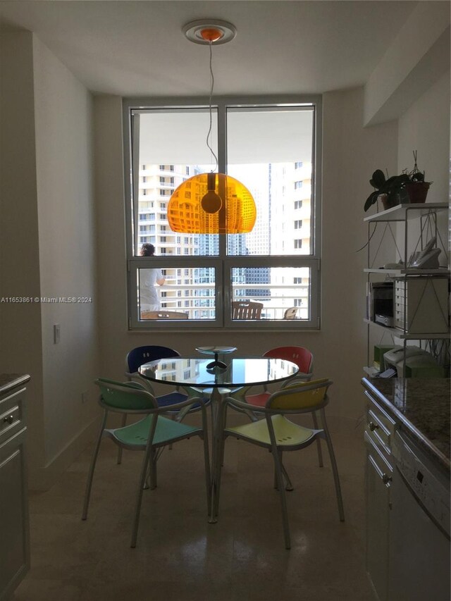 dining area featuring a healthy amount of sunlight