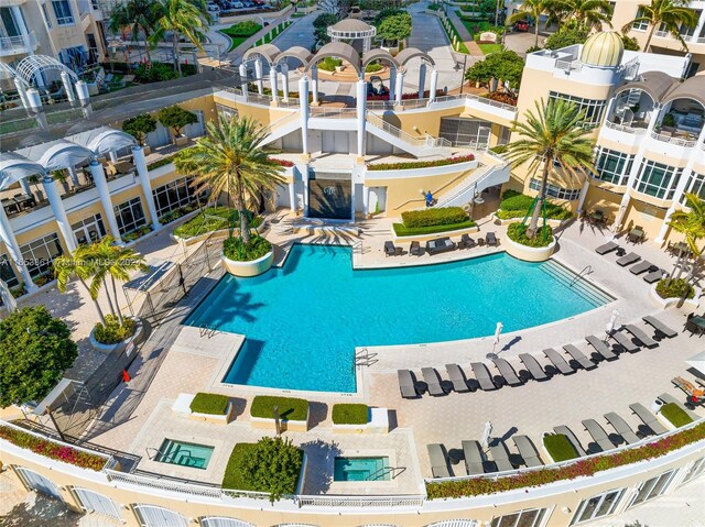 view of swimming pool with a patio