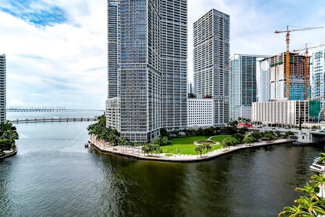 property's view of city with a water view