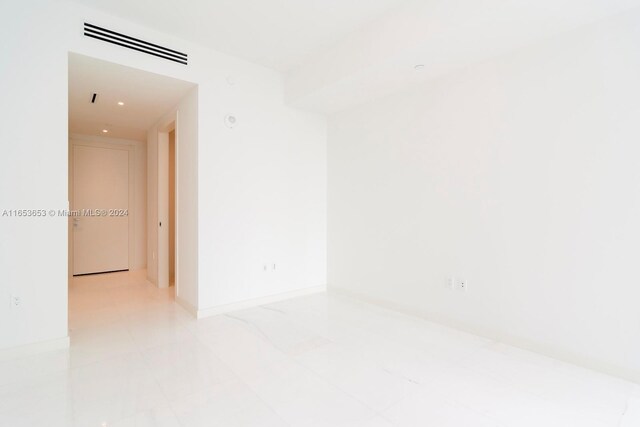 300 Biscayne Blvd Way Unit 902, Miami, FL 33131 - spare room featuring baseboards and visible vents