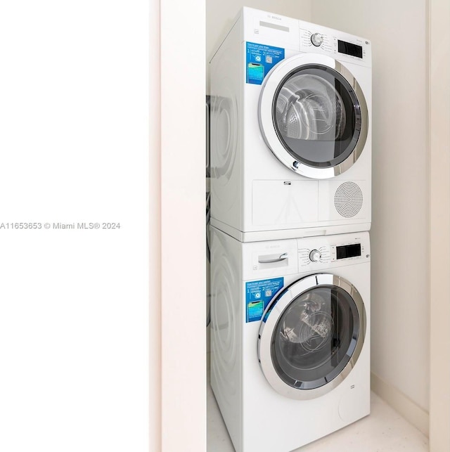 300 Biscayne Blvd Way Unit 902, Miami, FL 33131 - washroom with stacked washing maching and dryer and laundry area