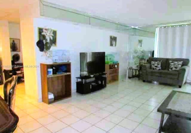 living room with light tile patterned floors