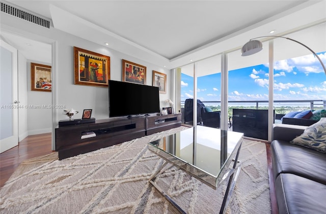 living room with hardwood / wood-style flooring