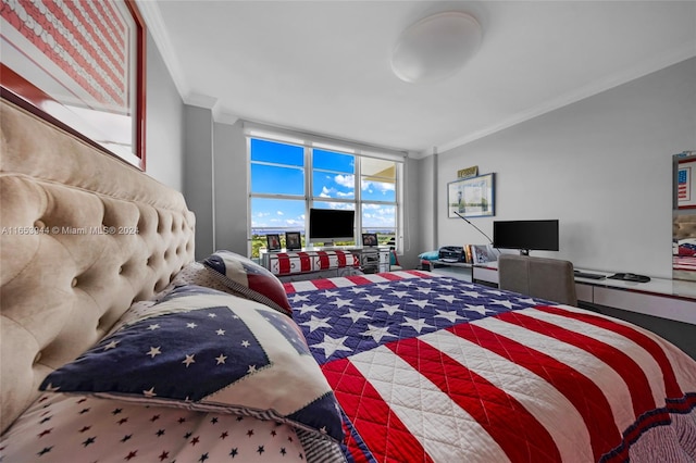 bedroom with floor to ceiling windows and ornamental molding