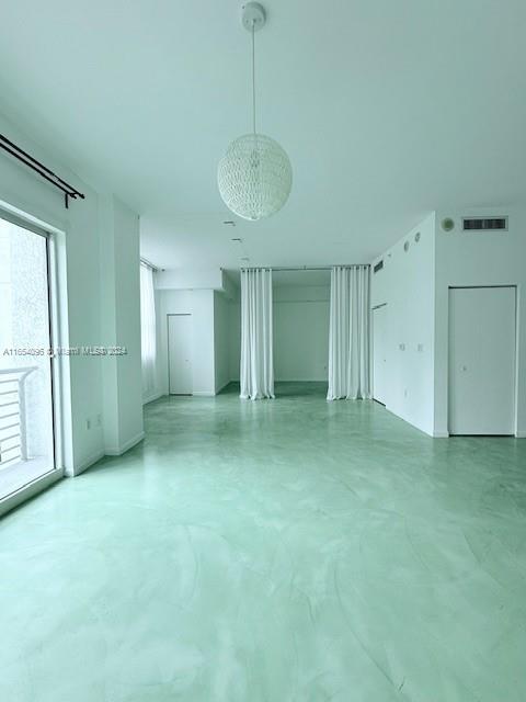 interior space featuring concrete flooring