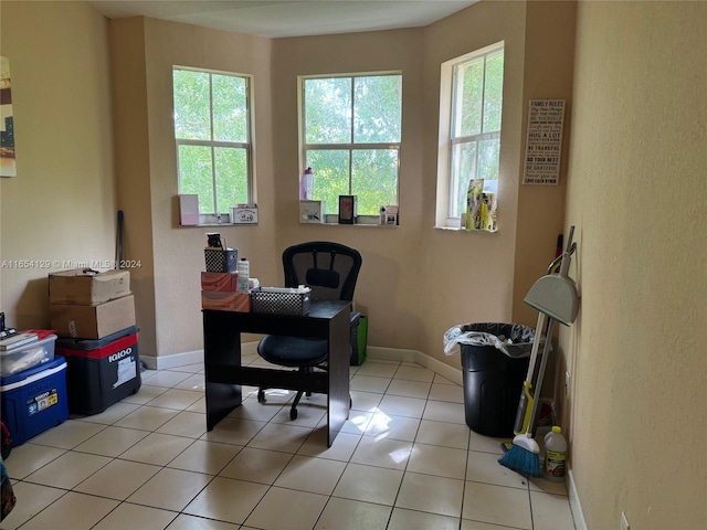 home office featuring plenty of natural light and light tile patterned floors