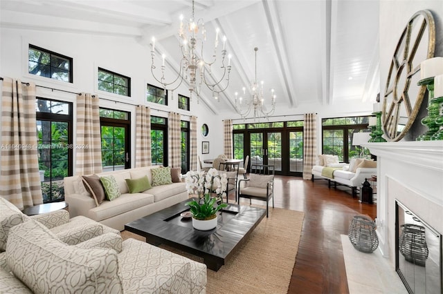 living room with beam ceiling, high vaulted ceiling, wood-type flooring, and a chandelier