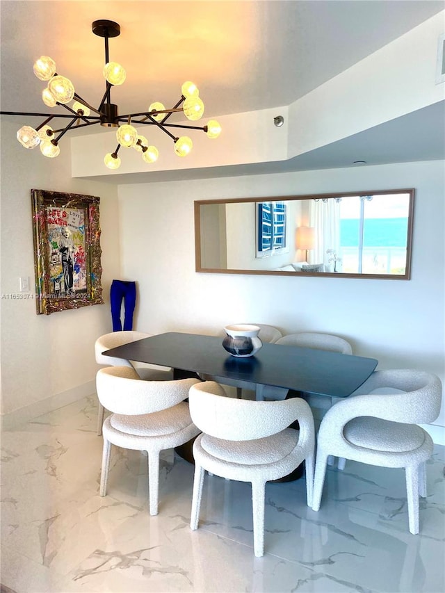 dining area with a chandelier