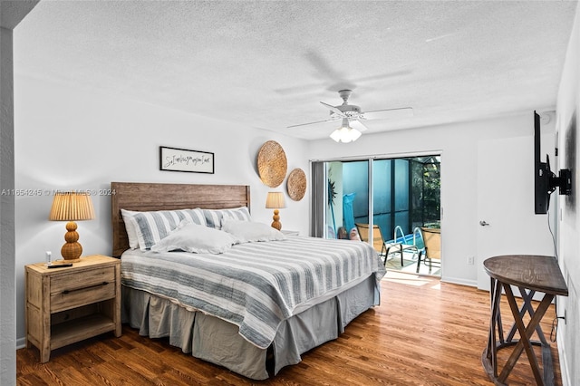 bedroom with a textured ceiling, hardwood / wood-style flooring, ceiling fan, and access to outside