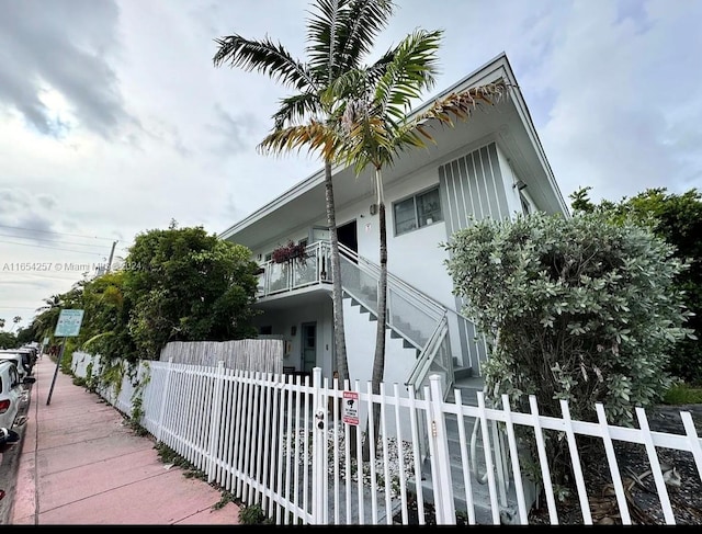 view of property exterior featuring a balcony