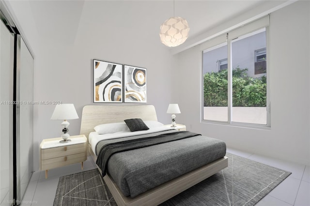 bedroom with tile patterned floors