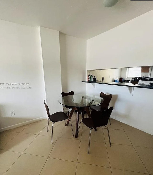 view of tiled dining area