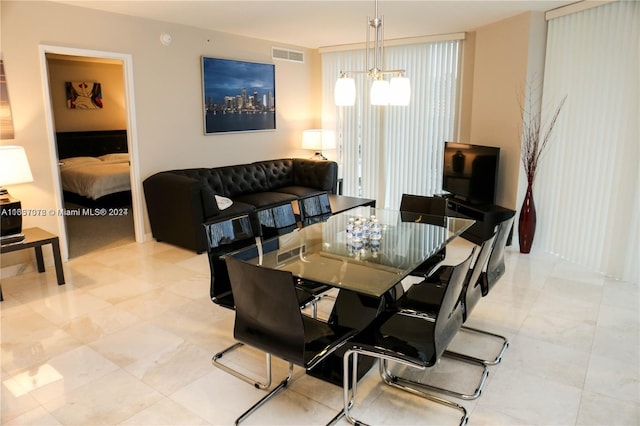 dining room with an inviting chandelier