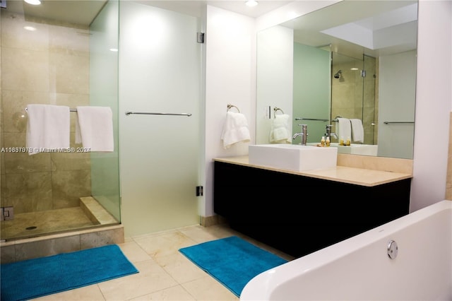 bathroom featuring vanity, independent shower and bath, and tile patterned floors