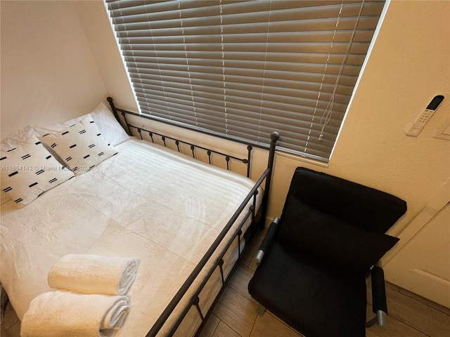 bedroom featuring light hardwood / wood-style flooring