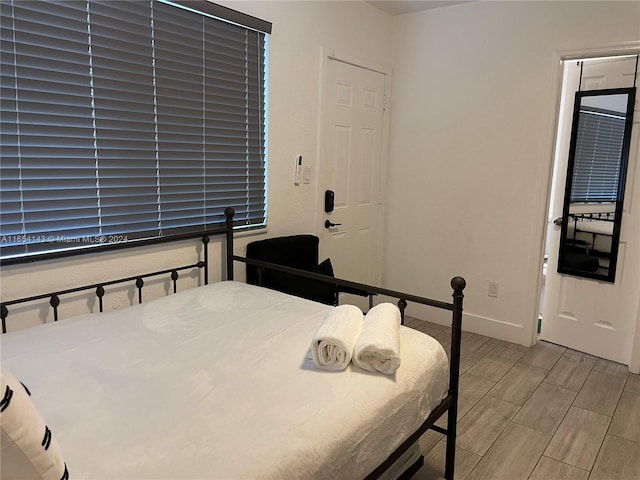 bedroom featuring light wood-type flooring