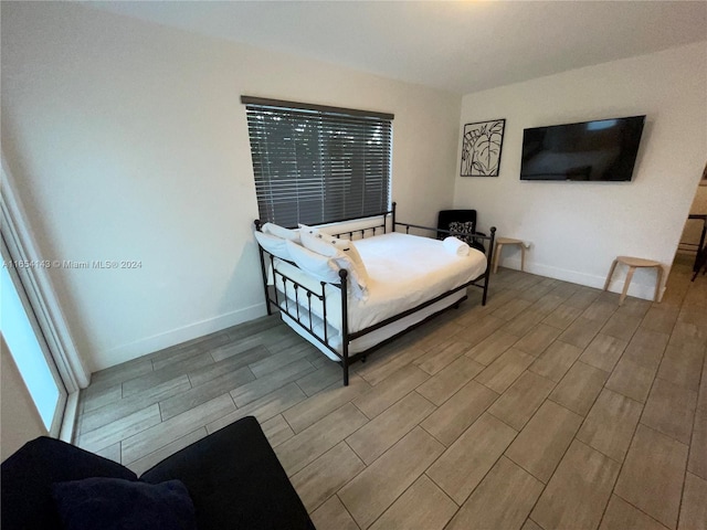 bedroom featuring light hardwood / wood-style floors