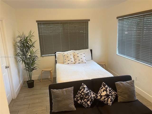 bedroom with light wood-type flooring