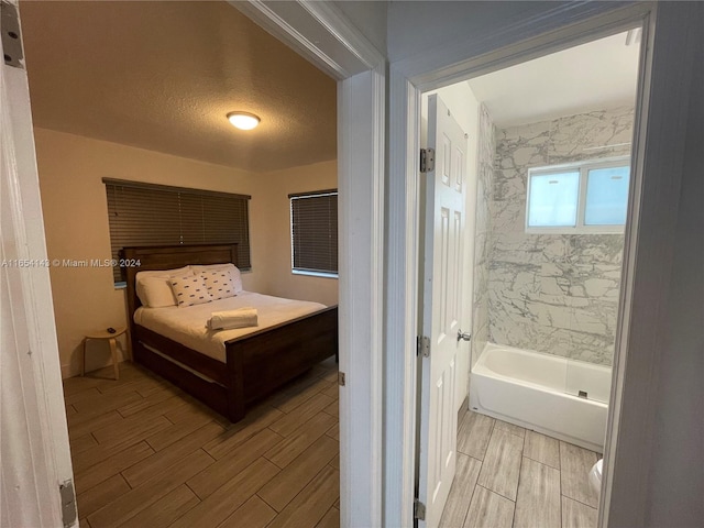 bedroom featuring a textured ceiling