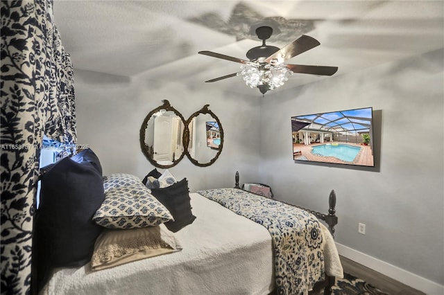 bedroom featuring ceiling fan and wood-type flooring