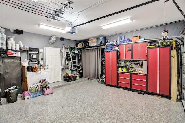 garage featuring a garage door opener