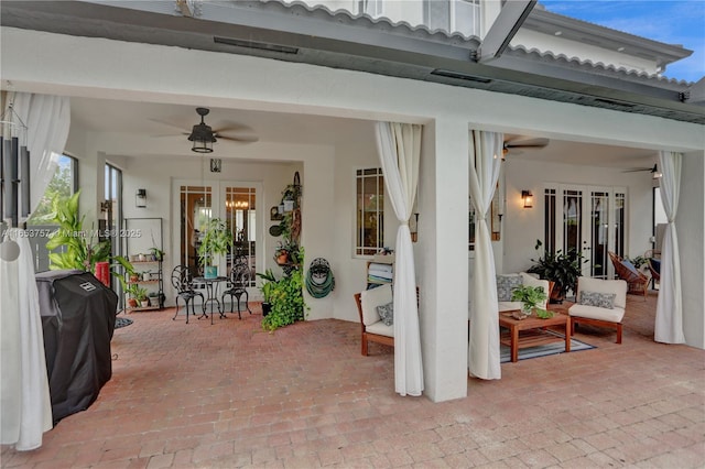 view of patio / terrace featuring a grill, ceiling fan, and french doors