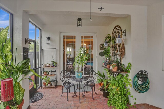 sunroom / solarium with french doors