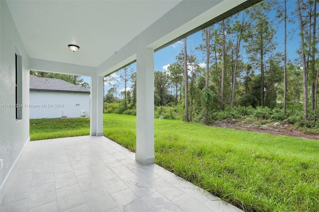 rear view of property with a lawn