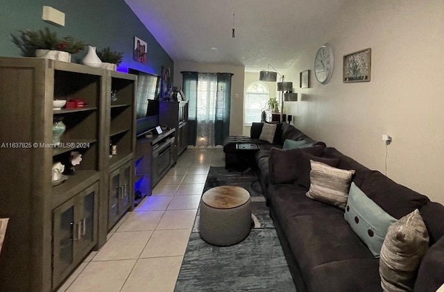 tiled living room with vaulted ceiling