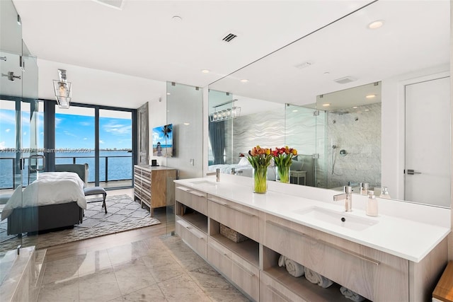 full bath featuring visible vents, a shower stall, vanity, recessed lighting, and ensuite bath