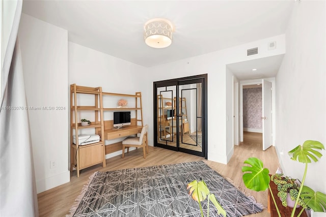 office space featuring light hardwood / wood-style flooring