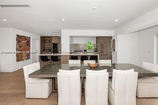 dining area with light hardwood / wood-style floors