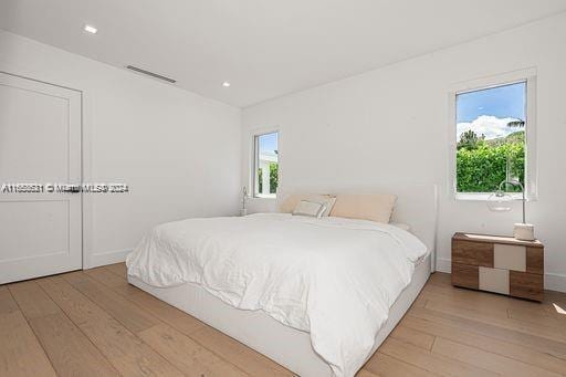 bedroom featuring light hardwood / wood-style floors