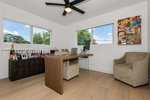 5231 SW 65th Ave, South Miami, FL 33155 - office featuring light wood-style flooring and ceiling fan