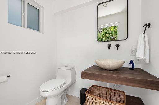 bathroom featuring toilet