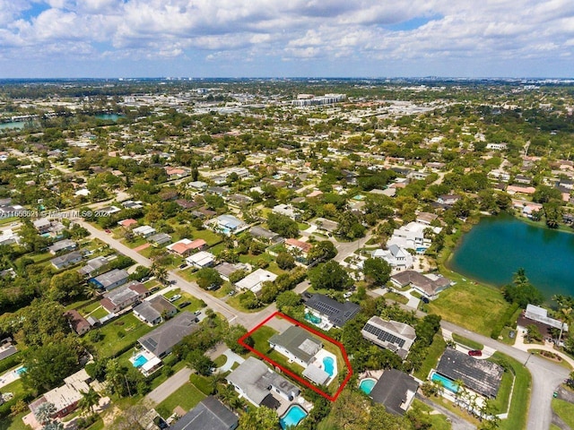 drone / aerial view with a water view