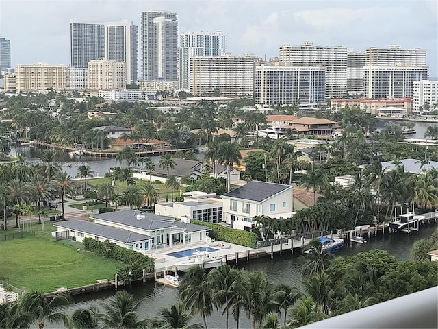 property's view of city with a water view