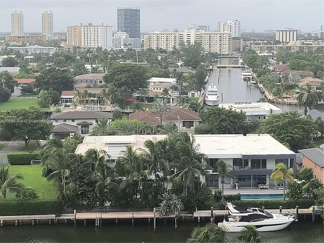 aerial view featuring a water view and a city view