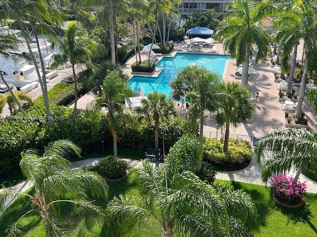 pool featuring a patio and fence