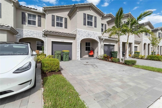 view of front of property featuring a garage