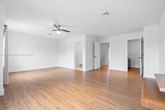 spare room with ceiling fan and light hardwood / wood-style floors