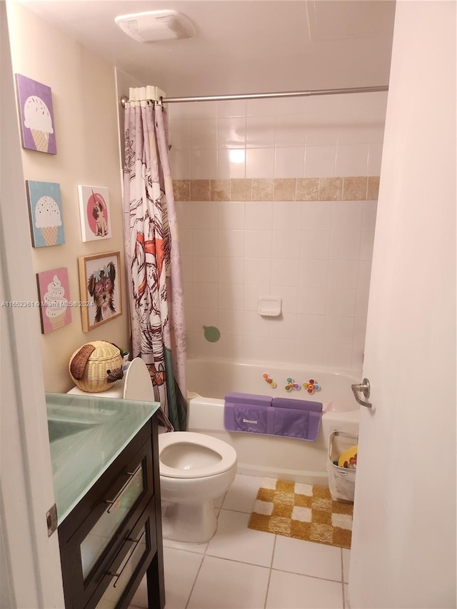 full bathroom featuring vanity, shower / tub combo with curtain, tile patterned flooring, and toilet