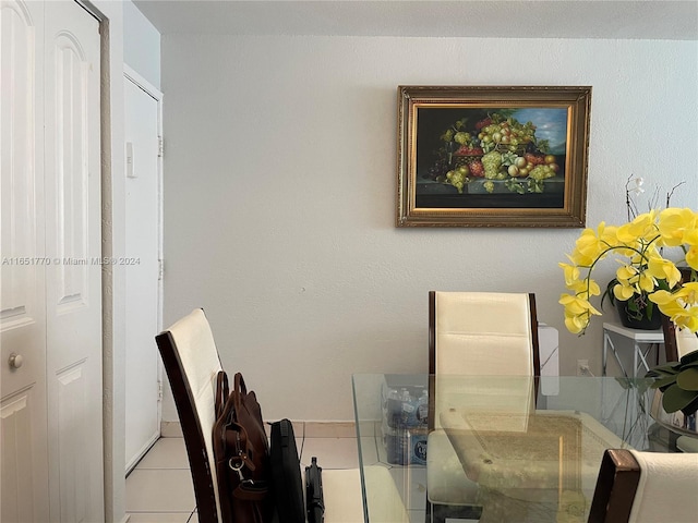 dining room featuring light tile patterned floors