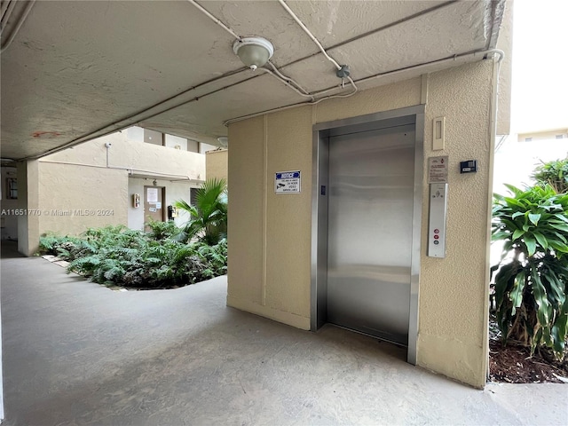 property entrance featuring elevator