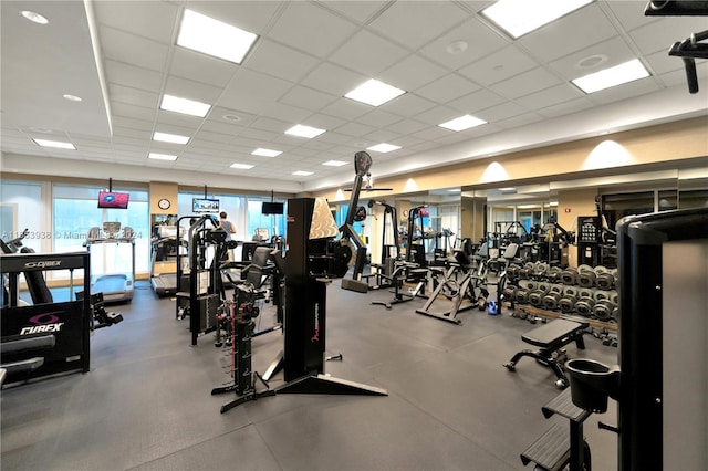 gym featuring a drop ceiling