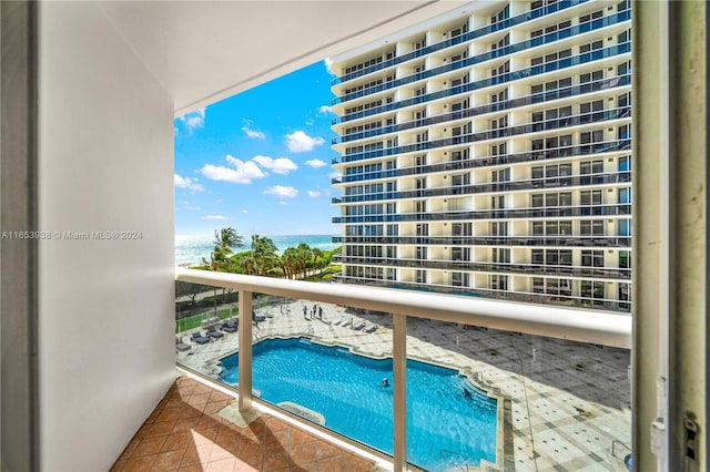 balcony featuring a water view