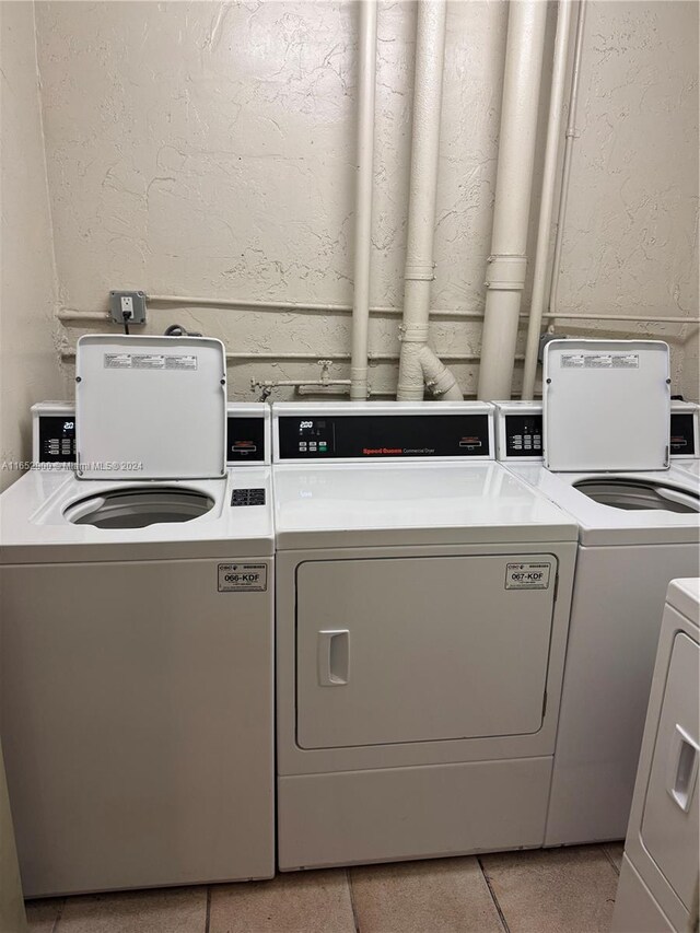 laundry area with washer and clothes dryer