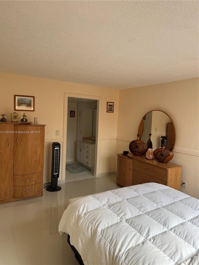 bedroom featuring a textured ceiling