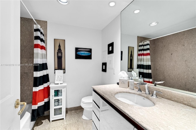 full bathroom with vanity, shower / bath combo, toilet, and tile patterned flooring